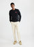 black sweatshirt with embroidery of boken red wine glass on left hand side of chest