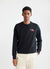 black sweatshirt with embroidery of boken red wine glass on left hand side of chest