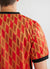 red football shirt with diamond shapes