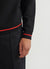 black cardigan with a yellow chilli and blue pepper on the front, and a tomato on the back