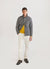 grey casentino overshirt styled with yellow hikaru zip, white trousers and black boots