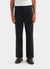black wide leg trousers styled with black boots and a white t shirt