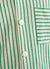 green and white striped long sleeve shirt with oversized buttons