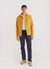 yellow casentino overshirt styled with navy trousers and a white t shirt
