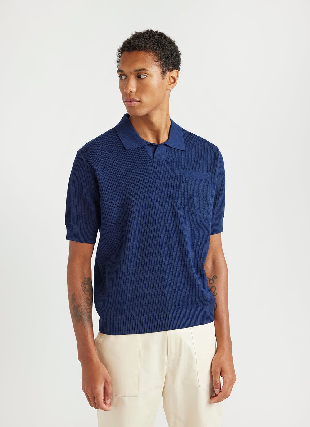 Navy knitted polo shirt hotsell