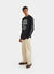 black long sleeve t shirt with white print of cartoon snail and text "quite pricey"
