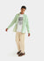 white long sleeve t shirt with black print of a cartoon snail and text "quite tricky"