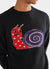 black crew neck with white dotted red snail on the chest