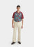 short sleeve football shirt with blue and brown diamond shapes