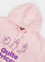 close up of pink hoodie with purple print of a tomato, an aubergine and a chilli with text "quite pricey"